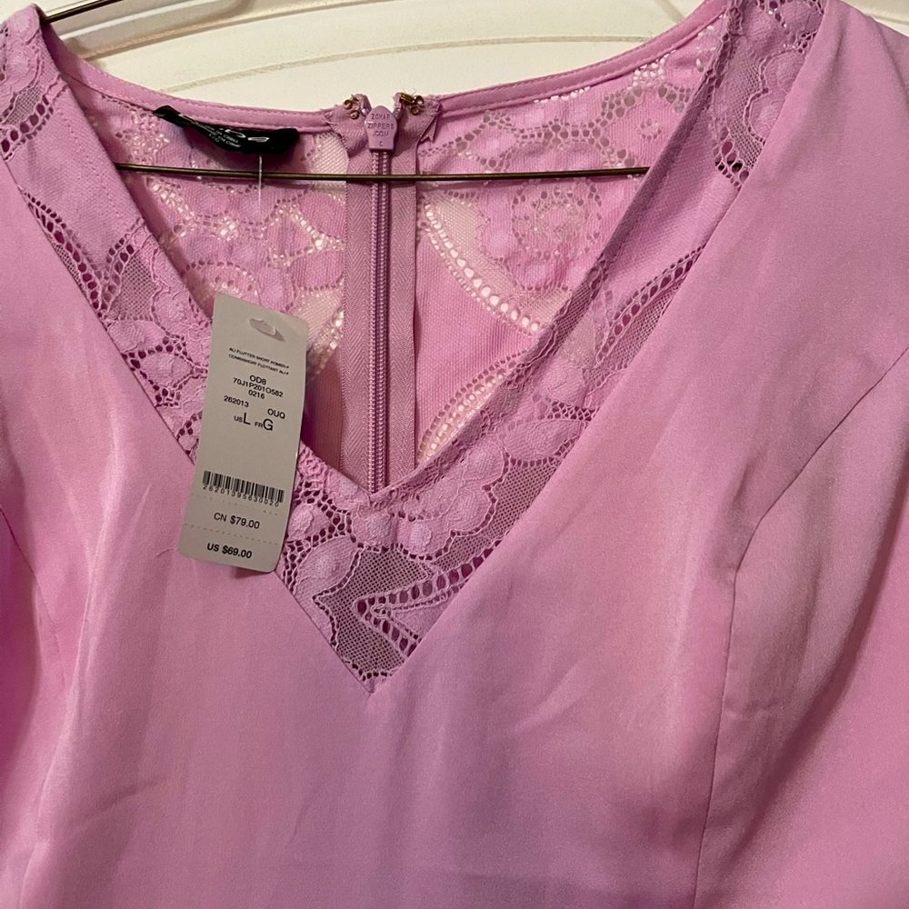 Bebe size large pink romper with lace detail
